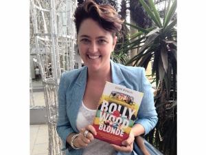 Gene Gualdi with her book Bollywood Blonde